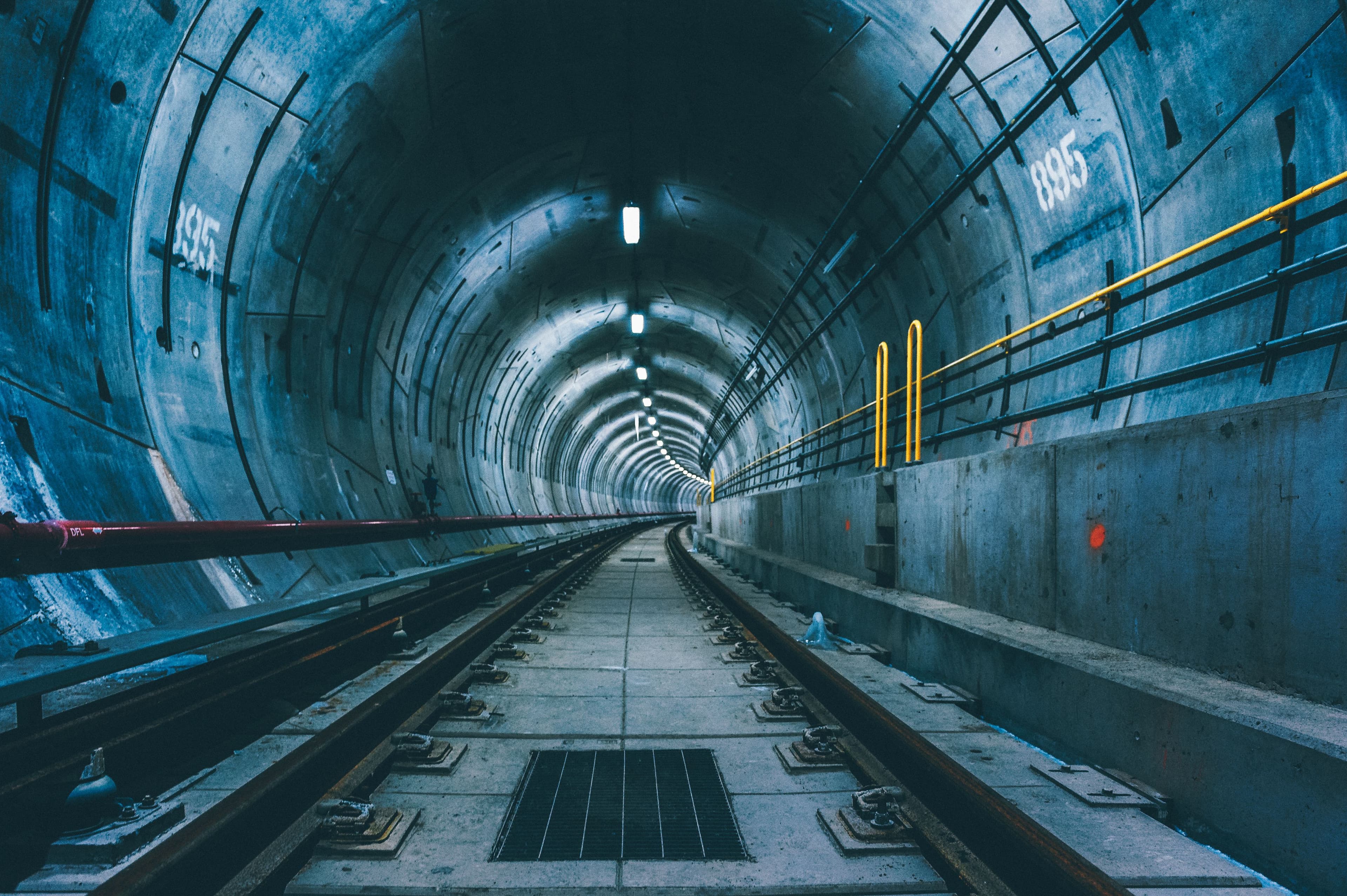 Underground rail tunnel with installed track and services